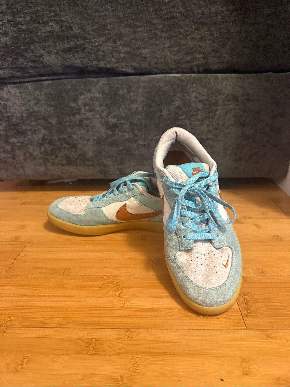 Nike Men’s Low-Top Sneakers in Light Blue and Orange Swoosh